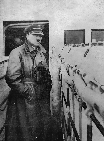 Adolf Hitler on the deck on the new Deutschland battleship